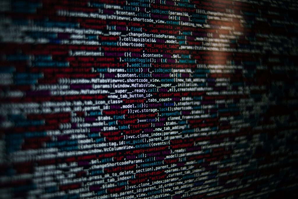 Close-up of website source code on a screen, the place injected SEO spam is found and removed